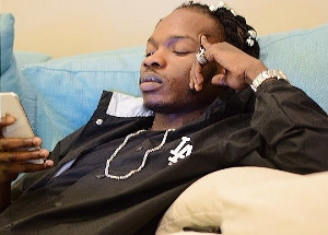 Naira Marley has been accused of money laundering and internet fraud