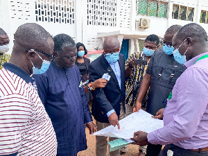 Benito Owusu-Bio inspecting the site plan