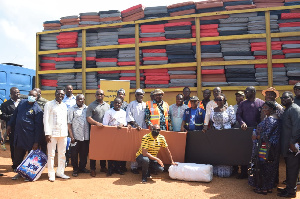 Volta Regional Minister, Archibald Yao Letsa and other officials presenting the items