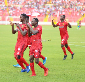 Asante Kotoko players celebrating a goal