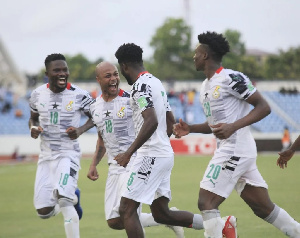 Black Stars players celebrating a goal