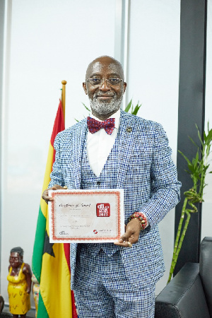 GIPC boss, Yofi Grant with the award