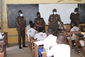 Director-General of Prisons, Isaac Kofi Egyir with other officers during the visit