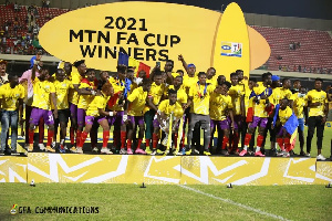 Hearts of Oak lifting the FA Cup trophy. Credit: GFA Communications