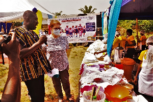 Obed Mante Asare leading an official on inspection