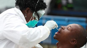 File photo: A health professional attending to a client