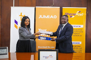 Jumia rep exhange agreements with of deouty MD of Ghana Post Kwaku Tabi Amponsah