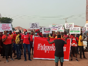 Residents of Agape marching for their roads to be fixed