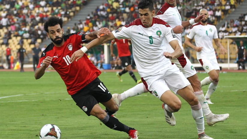 Egypt captain Mohamed Salah and Nayef Aguerd of Morocco challenge for possession during the 2021 Africa Cup of Nations Afcon Finals Quaterfinal match between Egypt and Morocco