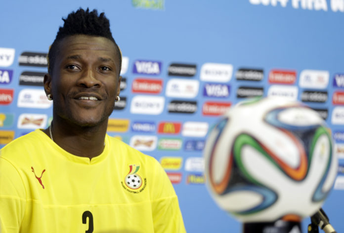 Ghana's Asamoah Gyan attends a news conference before an official training session the day before the group G World Cup soccer match between Ghana and the United States at the Arena das Dunas in Natal, Brazil, Sunday, June 15, 2014. (AP Photo/Dolores Ochoa)