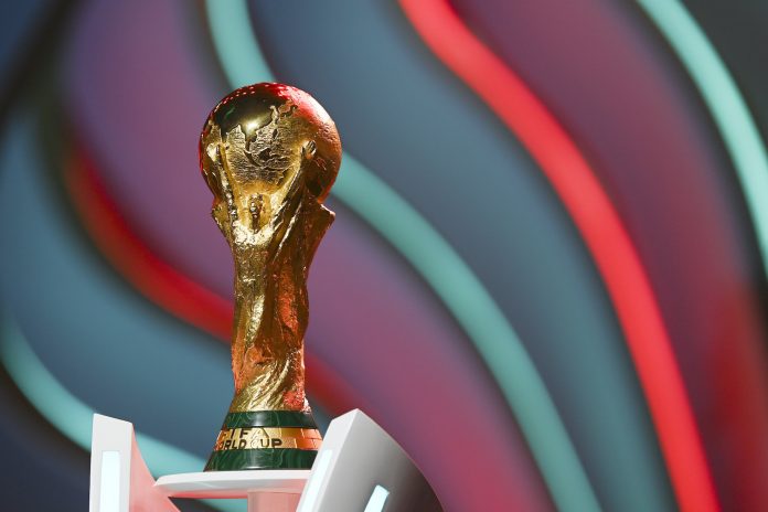 DOHA, QATAR - APRIL 01: The World Cup trophy is seen during rehearsal ahead of the FIFA World Cup Qatar 2022 Final Draw at Doha Exhibition Center on April 01, 2022 in Doha, Qatar. (Photo by Michael Regan - FIFA/FIFA via Getty Images)