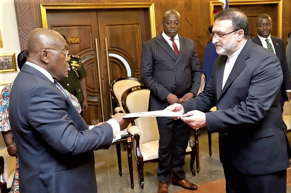 President Akufo-Addo receiving a letter of credence from Bijan Gerami Nazoksara (right), Iranian Ambassador to Ghana, at the Jubilee House. Pictures: SAMUEL TEI ADANO