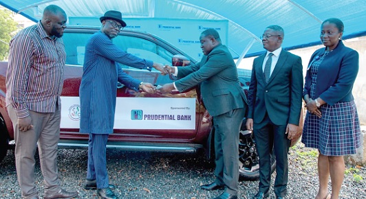 Thomas Broni (3rd from right) presenting the key to Dr Christian Addai-Poku