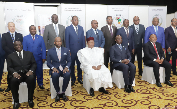 Mahamadou Issoufou (seated middle), Champion of AfCFTA, Wamkele Mene (seated 2nd from left), Secretary-General of AfCFTA, with the Council of Ministers responsible for trade including Alan Kyerematen (seated left)