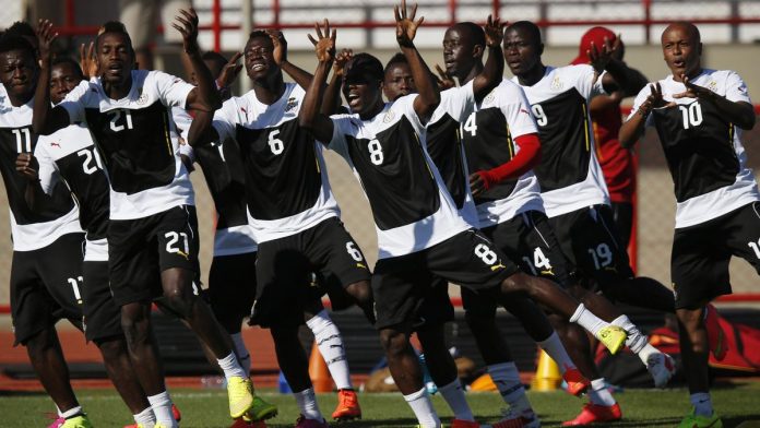 Ghana's national soccer team players sing and dance during a training session ahead of their 2014 World Cup against Portugal, in Brasilia June 25, 2014. Image credit: Reuters