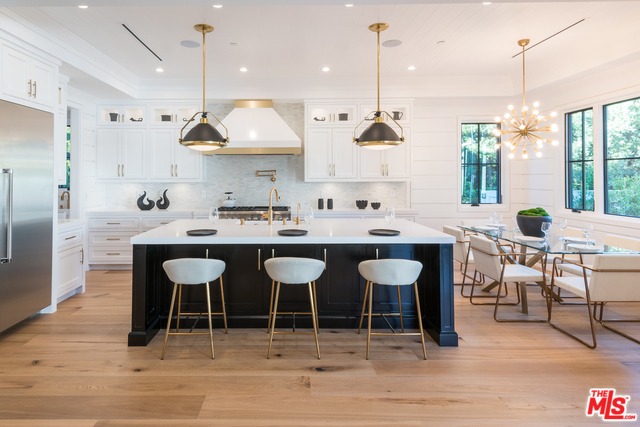 The modern kitchen and breakfast nook.