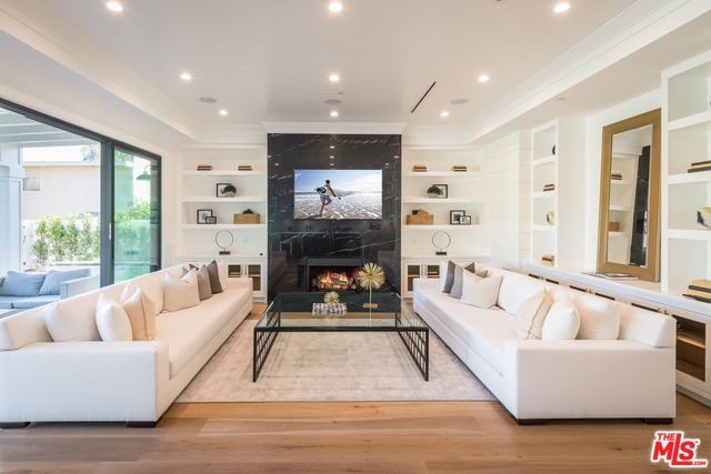 The family room boasts a sliding glass wall door.