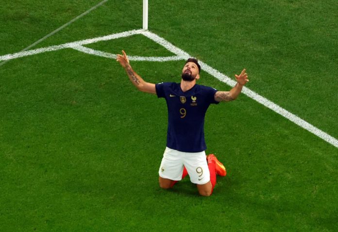 FIFA World Cup Qatar 2022 - Round of 16 - France v Poland - Al Thumama Stadium, Doha, Qatar - December 4, 2022 France's Olivier Giroud celebrates scoring their first goal REUTERS/Fabrizio Bensch