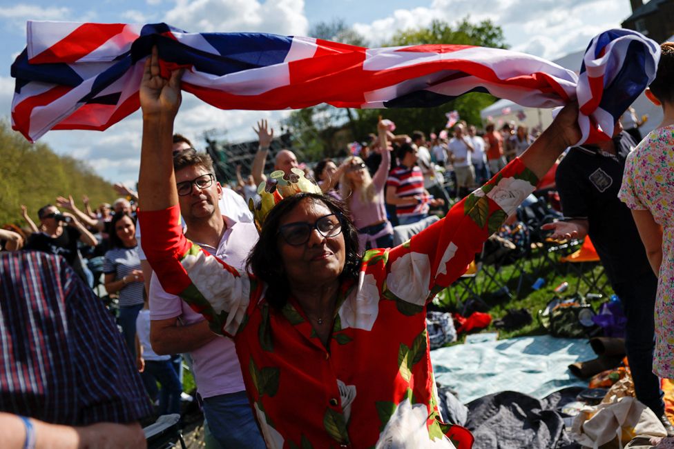 A person holds a Union Jack flag, along the Long Walk outside Windsor Castle, Britain, May 7