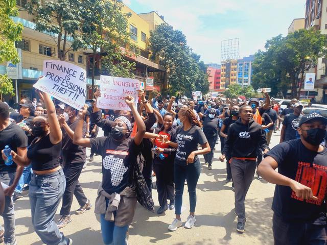 Kenyans protesting tax propasals in the Finance Bill 2024