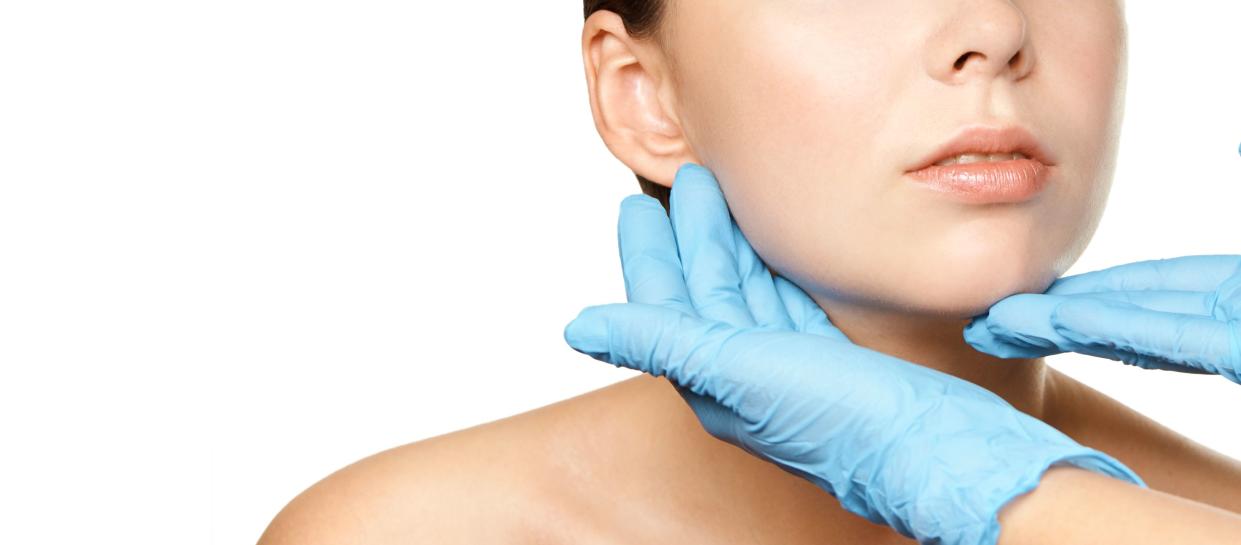 Facelift hydra treats. Esthetic skin care analysis. Doctor hands in gloves. medicine facial beauty exam. Symmetry consult. Cosmetology wrinkle specialist.