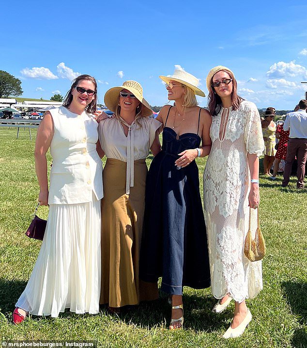 Phoebe, who has no qualms about showing off her designer wardrobe online, completed her look with a wide-brimmed cream hat featuring a lavish pearl chain