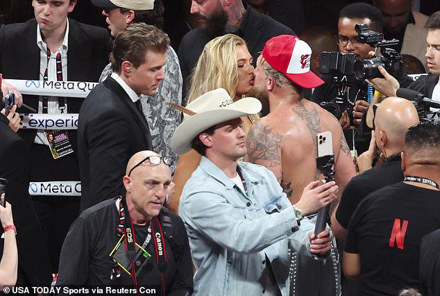 Pictured: Olympic skater Leerdam kisses her Youtuber-turned-boxer boyfriend Paul who claimed a unanimous decision against Tyson