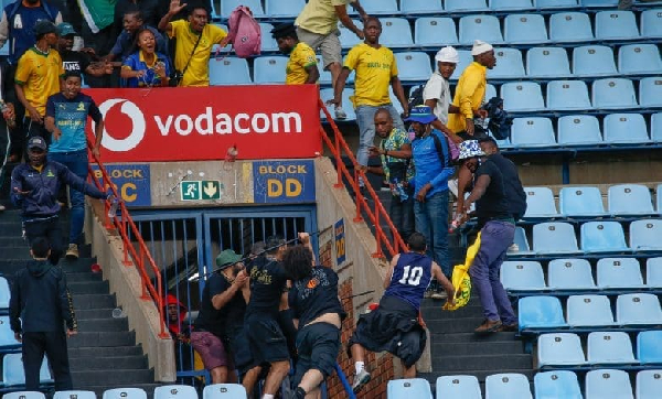 Watch horrible scenes as Sundowns fans clash with Esperance fans during CAFCC game 